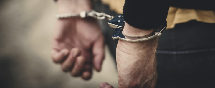 Man arrested with handcuffs after he assaulted someone.